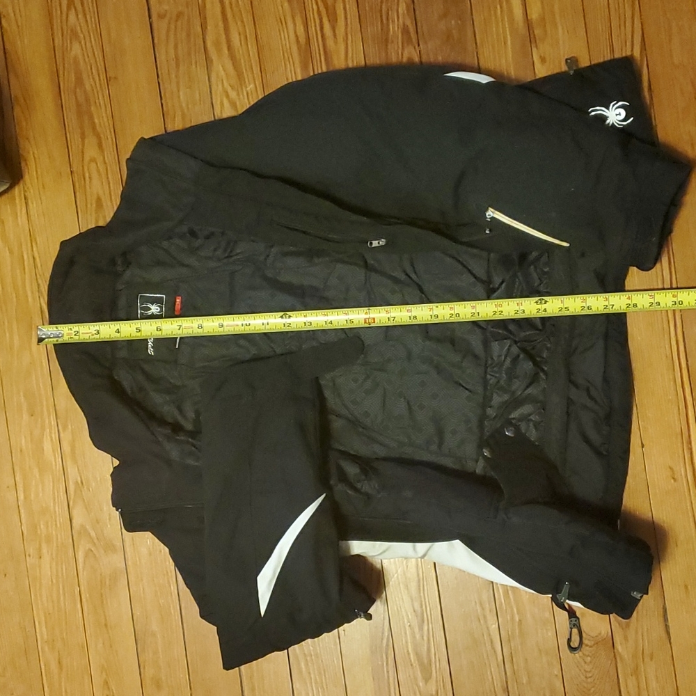 Black and white Spyder winter jacket, size 10 .